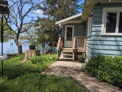 Cozy private cabin on a quiet lake with your own beach.