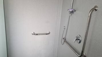 Shower, hair dryer, towels, toilet paper