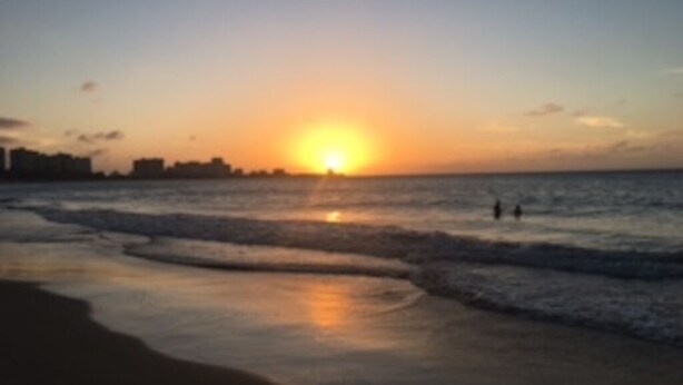 A beach scene with a sunset over the ocean. - PR-PARADISE, Serenity-3-BEDROOM-2 BathRM- APT -PARKING, POOL-WiFI-close to BEACH (Rio Grande)