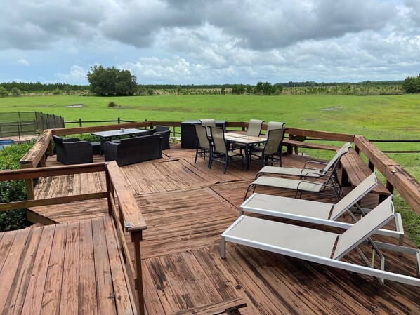 Outdoor dining - Former Hunting Lodge on 24 Acres with Lake with heated pool (Spring Hill)