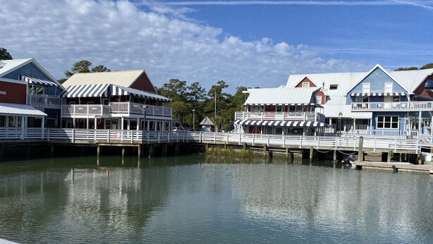 A waterfront property with multiple buildings, a dock, and a pier. - 3 Min Walk to Beach & Marina-Free Bikes/Pool/Tennis (Hilton Head Island)
