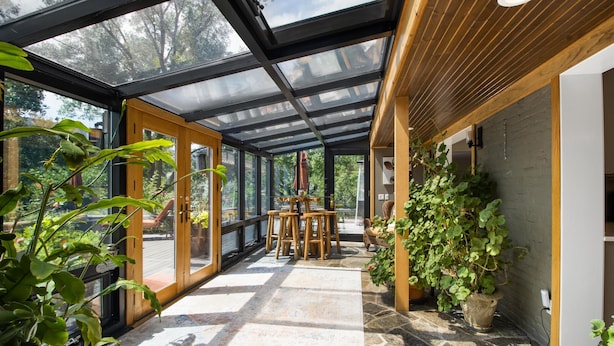 A covered outdoor area with a wooden ceiling, stone floor, and potted plants. - River Frontage! Family Friendly Mtn Retreat (Glenwood Springs)