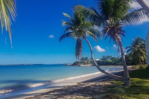 On the beach, white sand