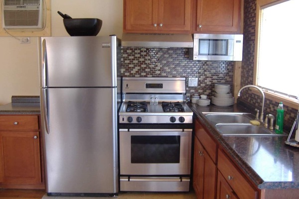 Microwave, coffee/tea maker, cookware/dishes/utensils, spices