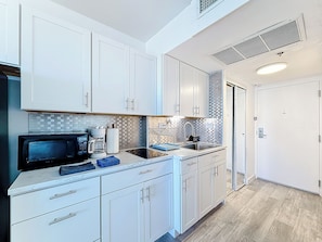 Fridge, microwave, coffee/tea maker, toaster