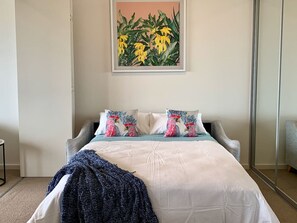 1 dormitorio, tabla de planchar con plancha, cuna de viaje y wifi gratis