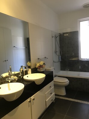 Shower, hair dryer, towels, soap