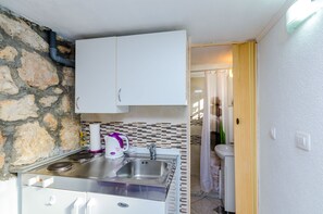 Private kitchenette | Fridge - Indy's Beach Apartments (Dubrovnik)