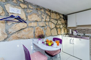 Private kitchenette | Fridge - Indy's Beach Apartments (Dubrovnik)