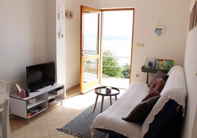 Apartamento (One Bedroom Apartment) | Sala de estar