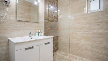 Shower, hair dryer, soap, shampoo