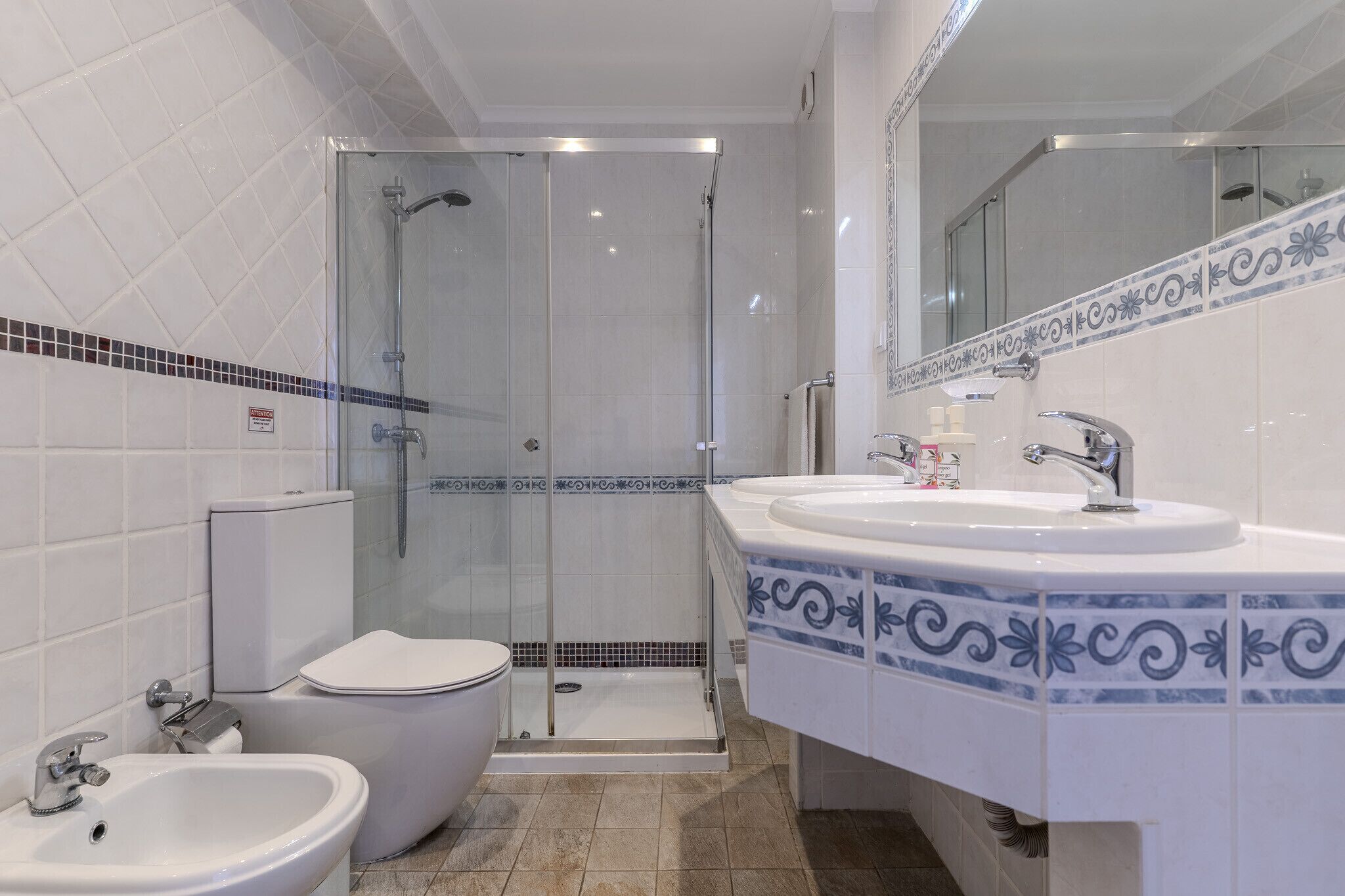 Shower, hair dryer, soap, shampoo