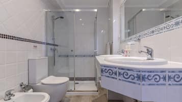 Shower, hair dryer, soap, shampoo