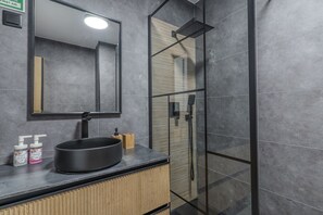 Bathtub, hair dryer, soap, shampoo