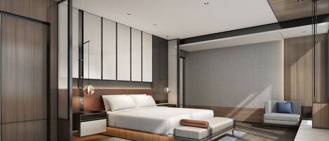 A modern bedroom with a large bed, bedside tables, a seating area, and a view of the outside.