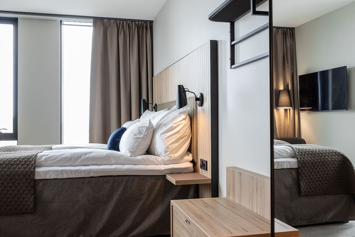 standard double room, non smoking | living area | flat-screen tv