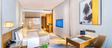 Deluxe Room, 1 King Bed, Non Smoking | Minibar, in-room safe, iron/ironing board, free cots/infant beds