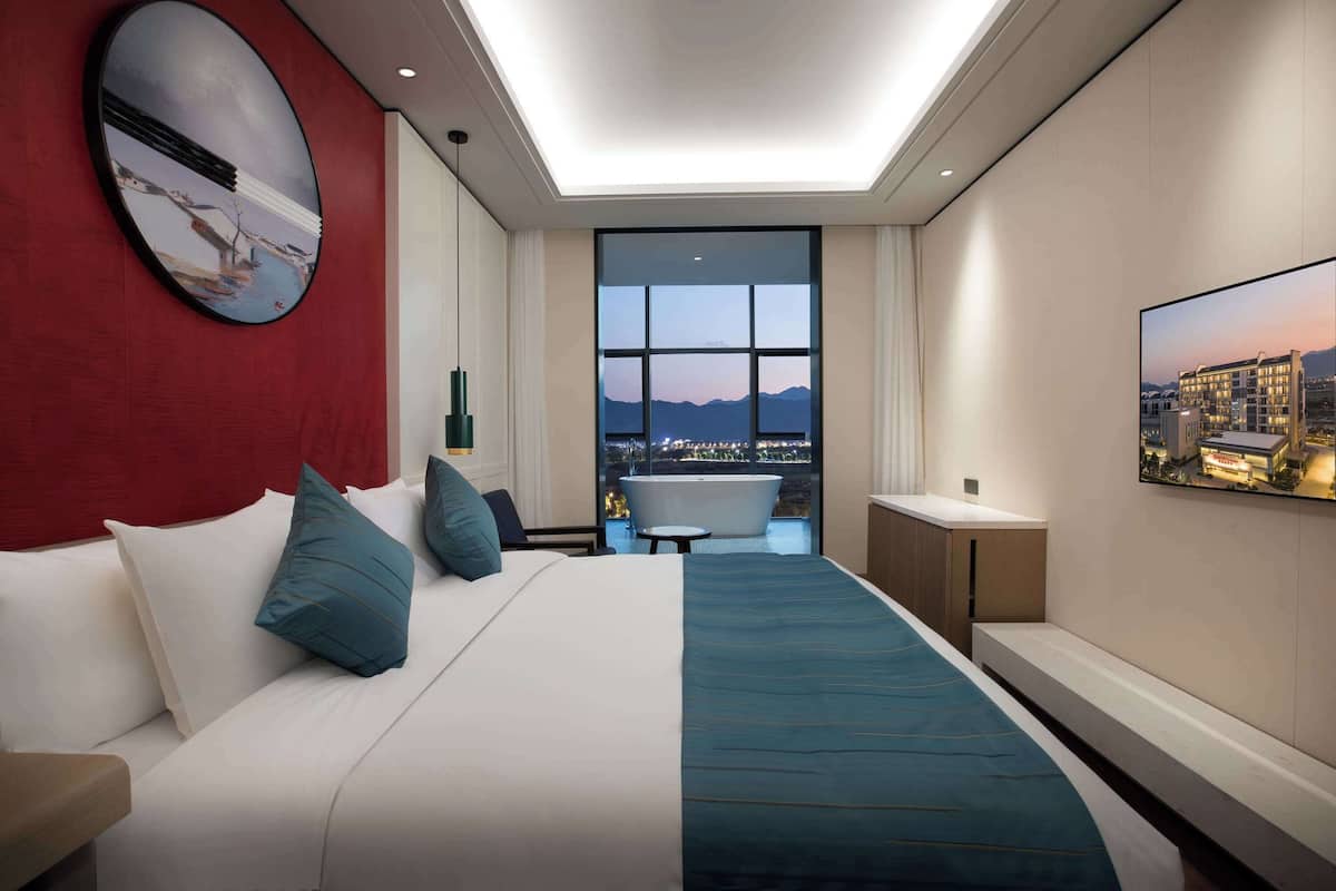 Room, 1 King Bed, Smoking, Mountain View (Feature Theme and river view) | Free WiFi