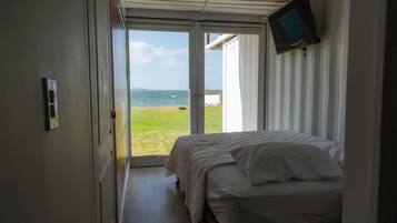 Premium bedding, memory-foam beds, blackout curtains, free WiFi