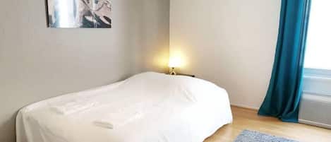 1 bedroom, desk, iron/ironing board, travel crib