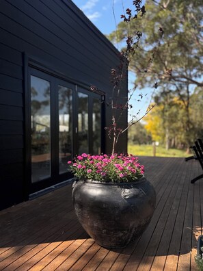 Terrace/patio - Kingaley Farmstay - riverside 20 acres of bliss - outdoor fire heated bath! (Fosterton)