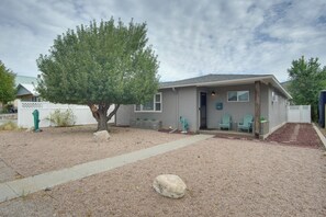 A single-story house with a gravel driveway, a large tree, and a mailbox. - 0651: Central Salida Home 5 Blocks to Dtwn & River (Salida)