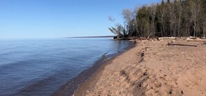 Enjoy a serene beach experience with access to the calm waters.