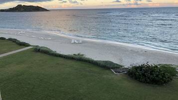 On the beach, sun loungers, beach towels