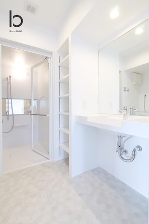 Bathtub, hair dryer, towels