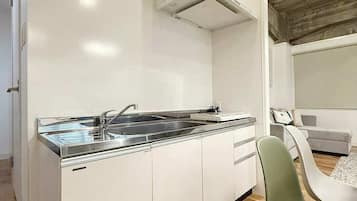 Fridge, microwave, stovetop, cookware/dishes/utensils