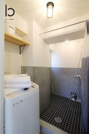 Shower, hair dryer, towels