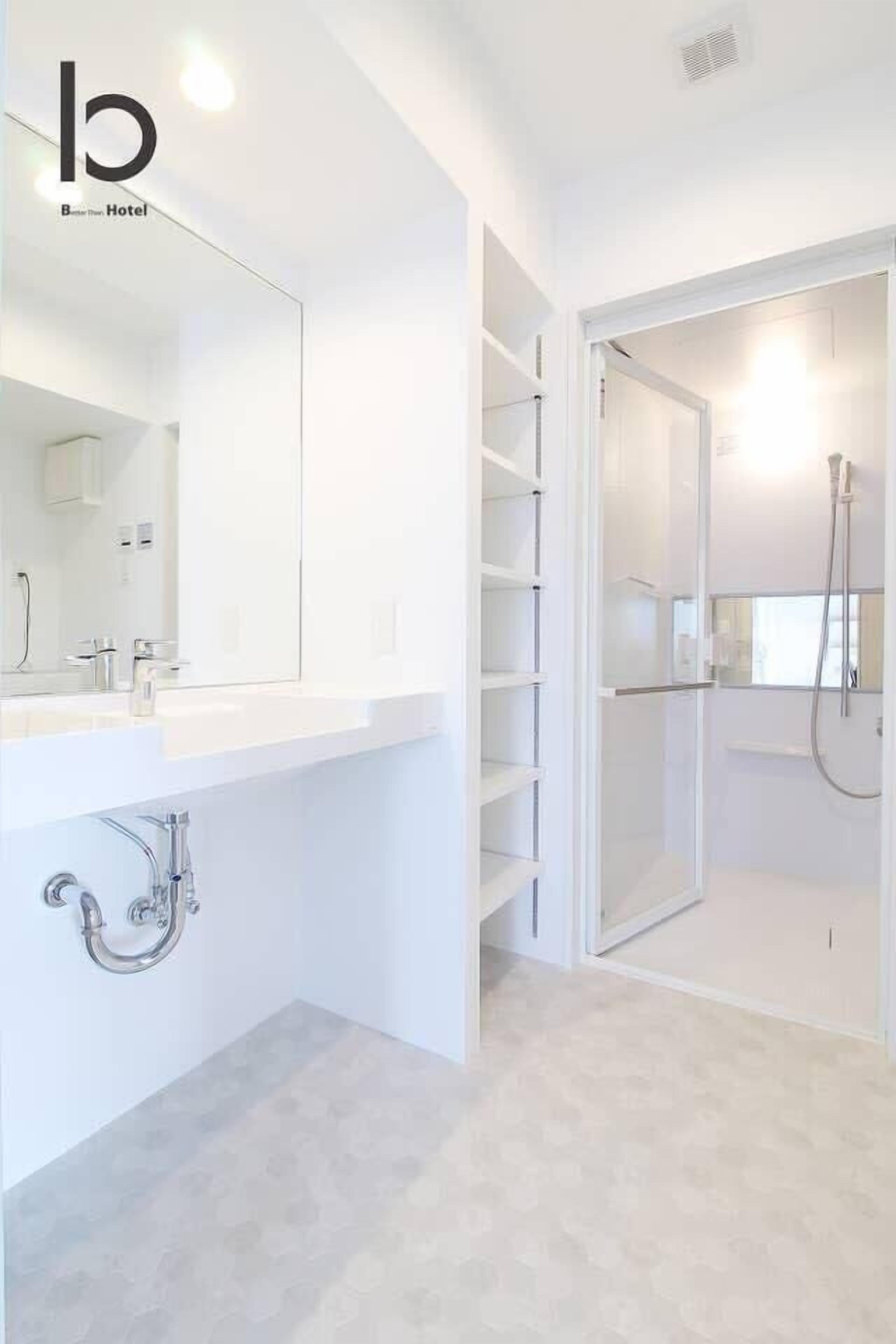 Bathtub, hair dryer, towels