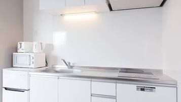 Fridge, microwave, stovetop, cookware/dishes/utensils