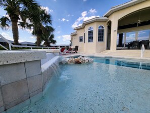 Outdoor pool, a heated pool - DIRECT SAIL BOATS -GULF Access 5 bedroom 3 bath , Villa stunning View, sleep 11 (Cape Coral)