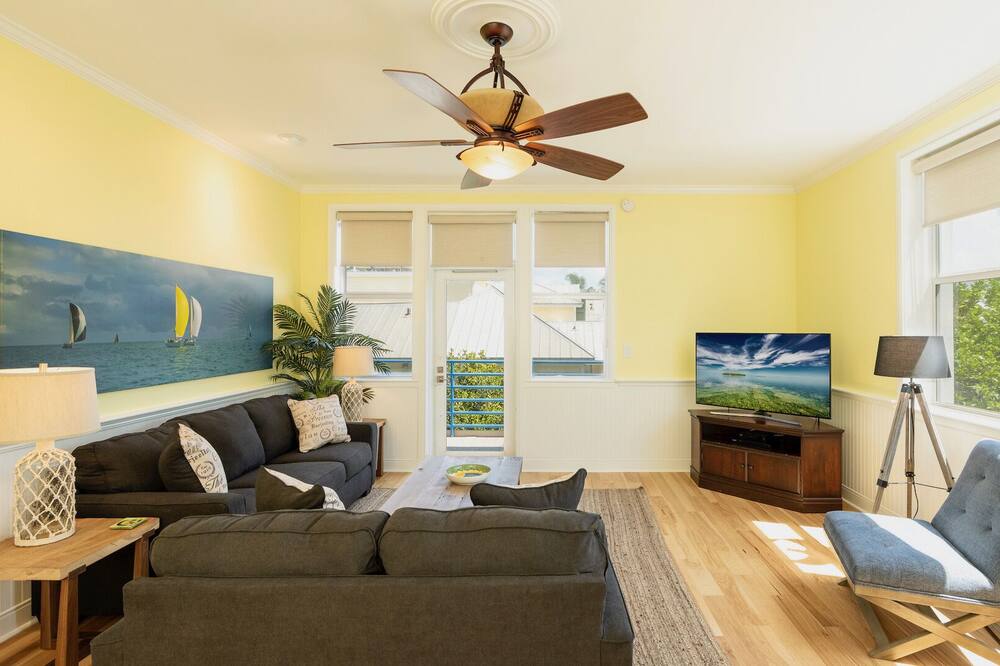 FLEXIBLE, NO-FEE CANCELLATION INCLUDED: Rentals are 100% Refundable until 30 days prior to your arrival!<br><br>OLD TOWN OASIS is back! After three years out of the rental program, this luxurious condo has returned, with all the same elegance enjoyed by many guests since 2004, and with many improvements.<br><br>You’ll be staying right near the ocean in Old Town but with all the quiet and solitude of an exclusive gated community. The Green Parrot (oldest blues bar in America) is just two blocks away, and yet Fort Zachery Taylor Park with its beautiful beach is just a short walk from your front door. <br><br>THE LIVING AREA…<br><br>The moment you step into the spacious foyer, you\'ll know you have entered a special place. OLD TOWN OASIS has been elegantly decorated to reflect tropical living at its finest, featuring local art and photography. All of the rooms are over-sized, with 11-foot ceilings and overhead fans. <br><br>The large sectional converts to a queen sleeper for extra guests. There’s a large Smart TV for those evenings you need a break from the excitement in Old Town.<br><br>The kitchen has been equipped with everything a demanding chef might require, on those nights you are not enjoying local cuisine out on the town.<br><br>THE POOL & THE BEACH…<br><br>The Community Pool is right downstairs, located directly on the waterfront. There are plenty of chaises for your comfort, and a cabana with restrooms for your convenience. Best of all, you’ll have “orchestra seats” to watch the sun set on the Gulf of Mexico. Fort Zachary Taylor State Park is a half mile away, with the prettiest beach in Key West.<br><br>THE ACCOMMODATIONS…<br><br>** Master Bedroom - King bed, sitting area, large TV, private balcony, a large walk-in closet and an en-suite bathroom with a spacious walk-in shower.<br><br>** Second Bedroom - Two Twins OR One King, a flat screen, large closets, and access to the hall bathroom with a walk-in shower.<br><br>ALL LAST KEY VACATION HOMES INCLUDE:<br><br>** Washer and Dryer<br>** Central Heat and A/C<br>** Ceiling Fans<br>** Flat Screen TVs in Living Room & All Bedrooms<br>** Fully Equipped Kitchen<br>** Basic stock of spices<br>** Starter supply of paper products<br>** Starter set of cleaning products<br>** Linens and Towels provided<br>** Wireless high-speed Internet access & full cable included<br><br>In addition, this fully stocked home also includes, but is not limited to the amenities on this list:<br><br>** Large Heated Community Pool<br>** One Garaged Off-street Parking Space<br><br>Other notes:<br><br>** Interim housekeeping provided upon request<br>** This property will accommodate up to 6 adults<br>** No Pets Allowed<br>** Last Key Realty vacation homes are rented to family groups and responsible adult groups only. Groups who expect they may cause after hours noise will not be a good fit for this home and should be aware they may incur additional penalties when in residence for violations. There will be a $500 charge for after-hours dispatch of our staff in response to calls resulting from verified noise complaints for violations by our guests in residence. **OLD TOWN OASIS @ THE ANNEX** Oceanside 2BR/2BA Condo & Pool + LAST KEY SERVICE