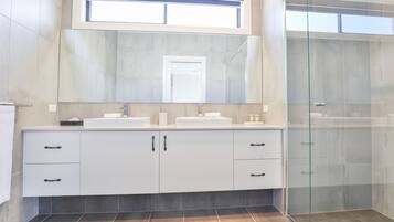 Luxury House | Bathroom | Hair dryer, towels, soap, shampoo