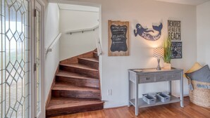 A staircase with wooden steps leading to a landing. - HEATED Pool! Amazing Ocean Views, Less than 1 Mile to Beach Access at Inlet, $300 in Free Tickets! (St. Augustine)