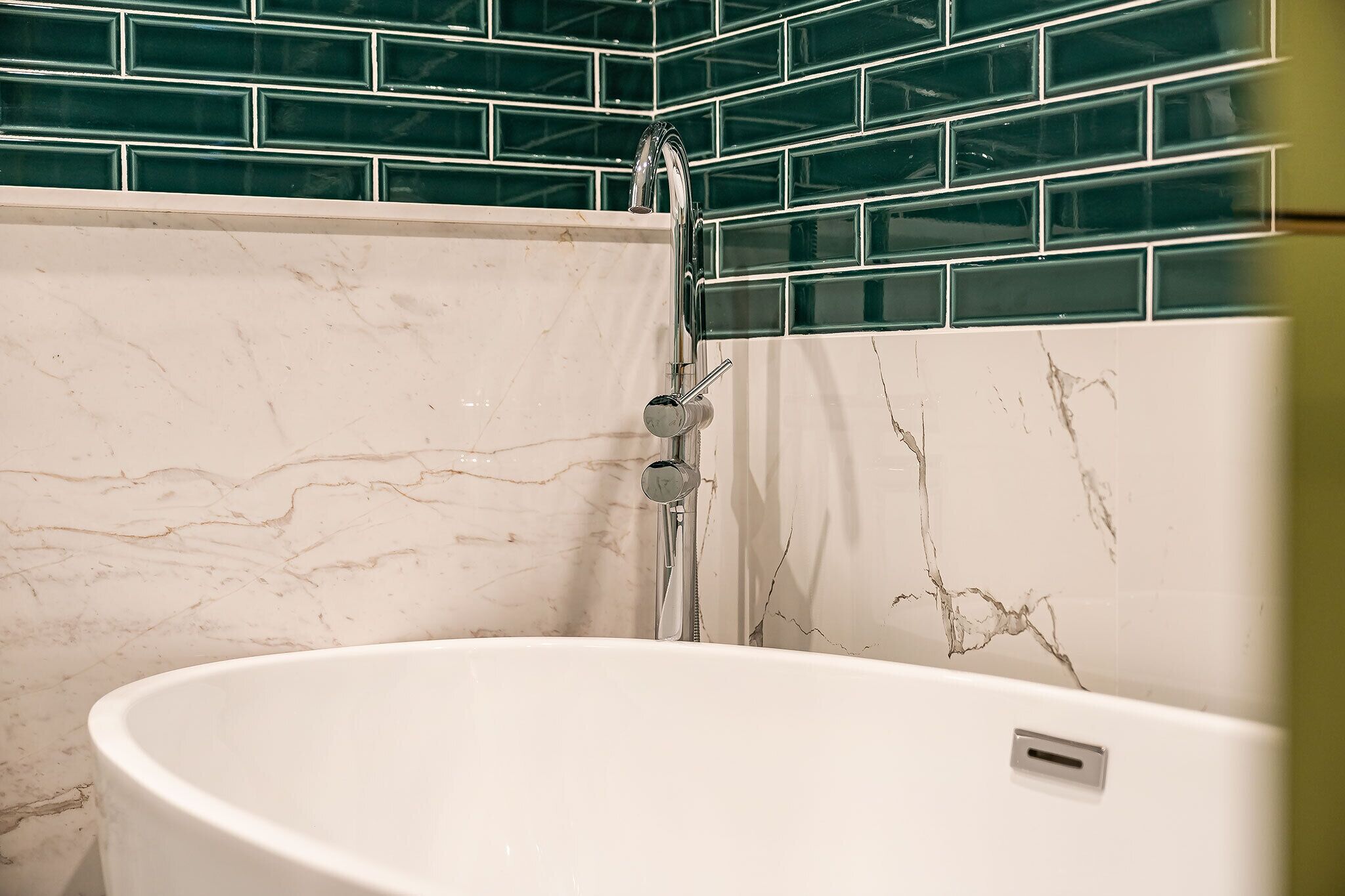 deluxe double room | bathroom | separate bathtub and shower, designer toiletries, hair dryer, bathrobes