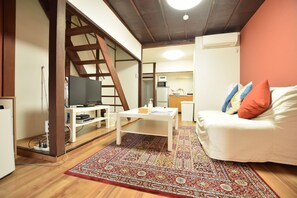 Maison (Private Vacation Home) | Salle de séjour | Téléviseur à écran plat
