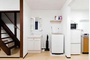 Private Vacation Home | Bathroom | Shower, hair dryer, slippers, bidet - Yagara Terrace House A (Osaka)
