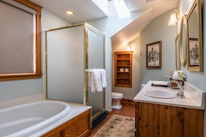 Bathtub, hair dryer, towels, soap