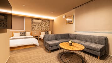 Superior D, Non Smoking | Living area | Flat-screen TV