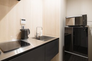 Standard B, Non Smoking | Private kitchen | Fridge, microwave, electric kettle, cookware/dishes/utensils - GRAND BASE Hakata Premium (Fukuoka)