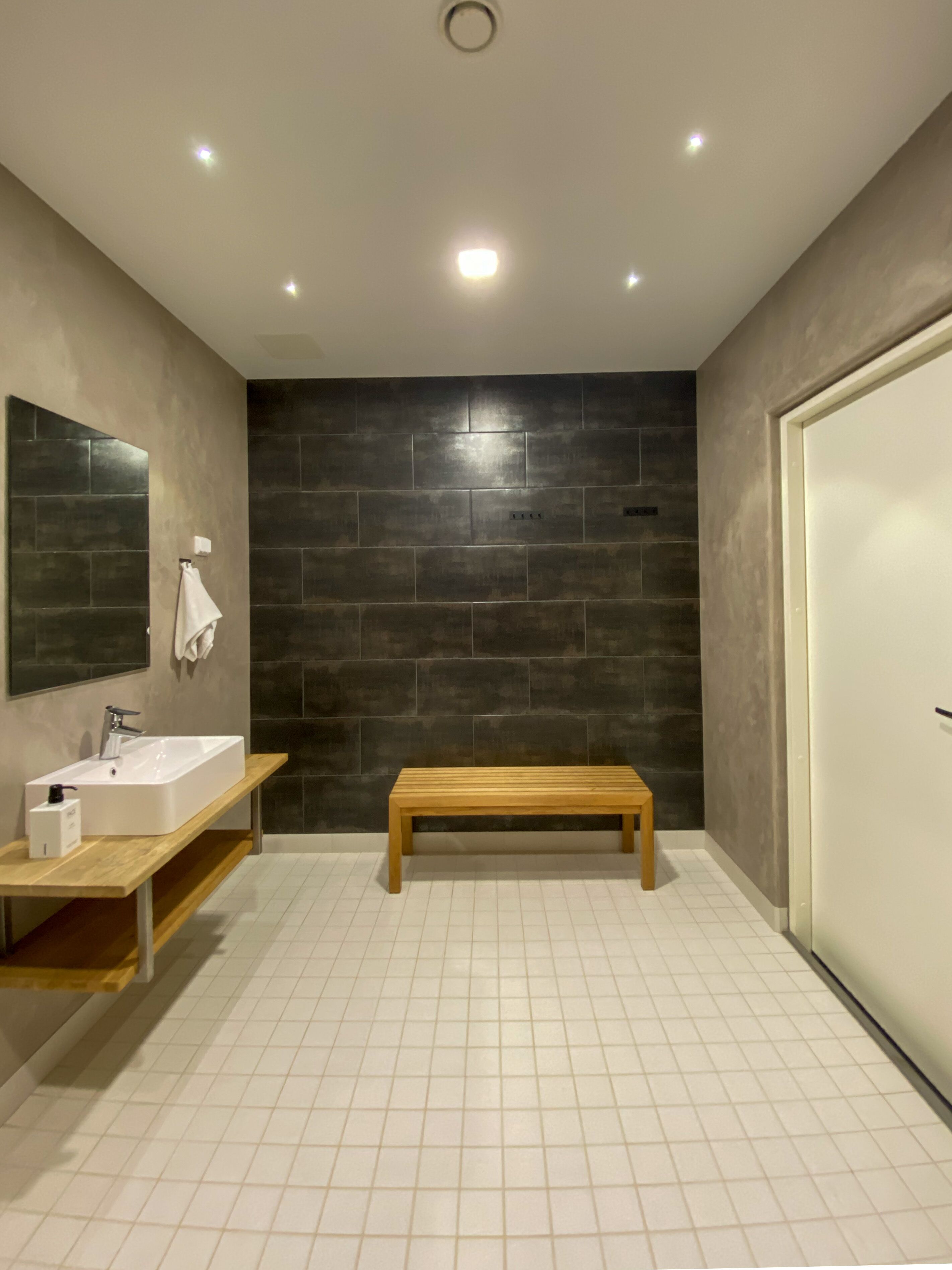 junior studio suite | bathroom | shower, hair dryer, bidet, towels