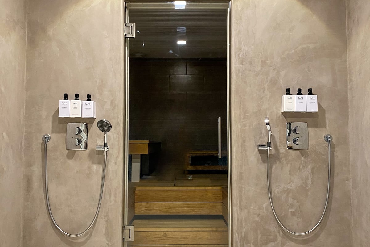 junior studio suite | bathroom | shower, hair dryer, bidet, towels