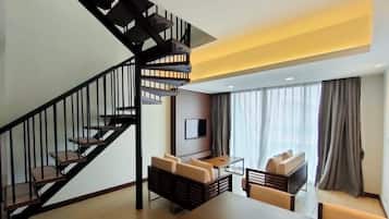 Suite Keluarga | Area keluarga | Televisi LED 40-inci dengan saluran TV digital dan TV