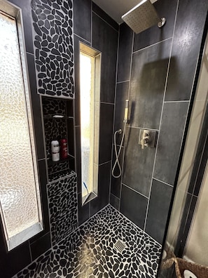 Bathtub, hair dryer, towels, soap