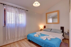 Casa | 2 quartos, roupa de cama