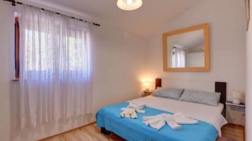 2 habitaciones y ropa de cama