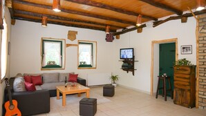 Cottage | Living room | Fireplace, DVD player - Traditional Stone Villa With a Private Pool and Complete Privacy (Zmijavci)